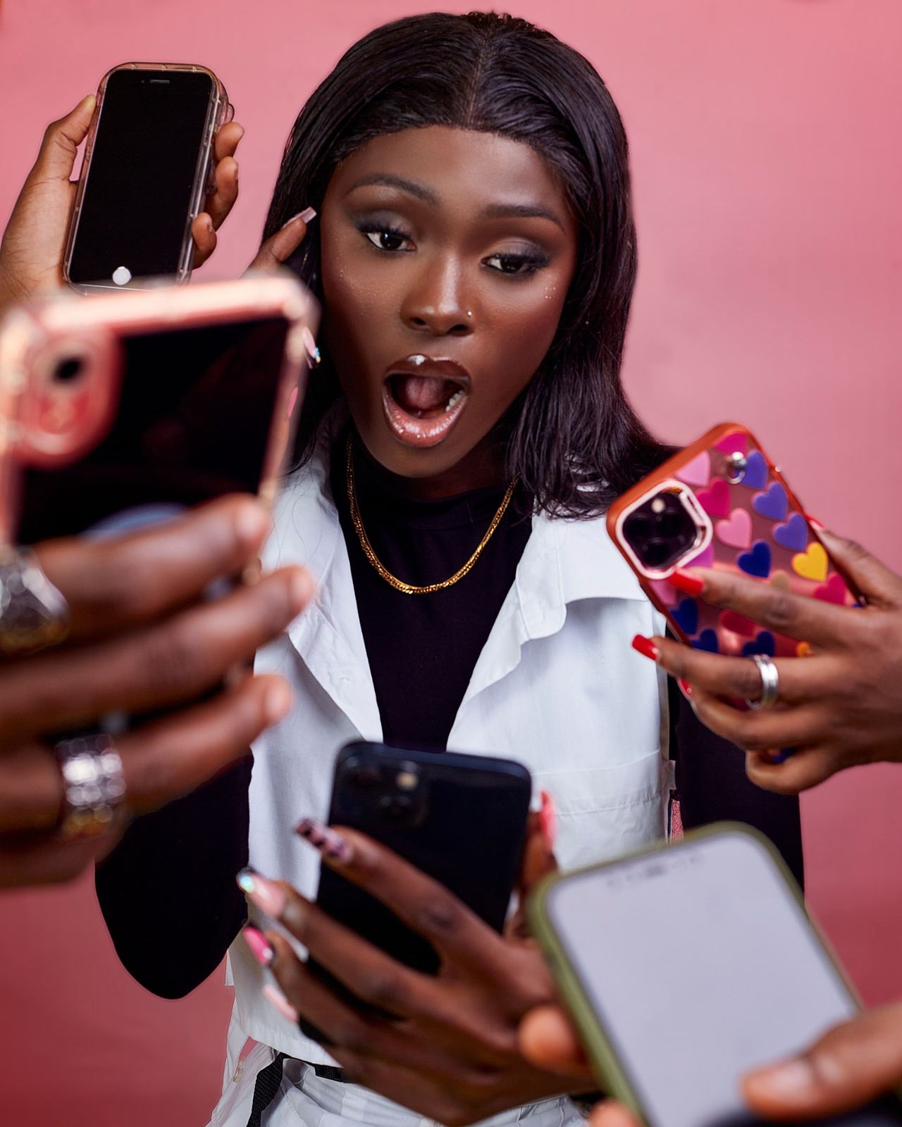 Two people reviewing a transaction on a phone